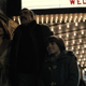 Thomas wayne holds martha and bruce.